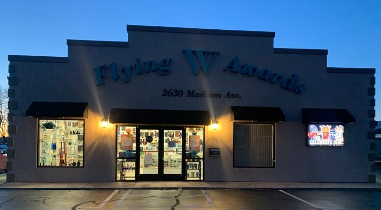 Flying W Awards store front at 2630 Madison Ave — family-owned trophy and awards shop since 1968